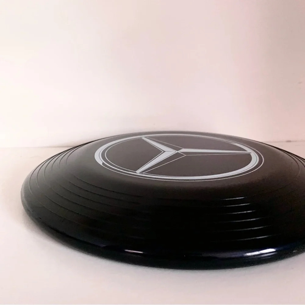 Hold Mercedes Benz frisbee